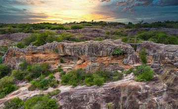 Aerial view of the rock arch on Cerro Arco in Tobati, Paraguay. by Jan Schneckenhaus