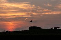 Coucher de soleil lors d'une soirée d'été étouffante à Muiden