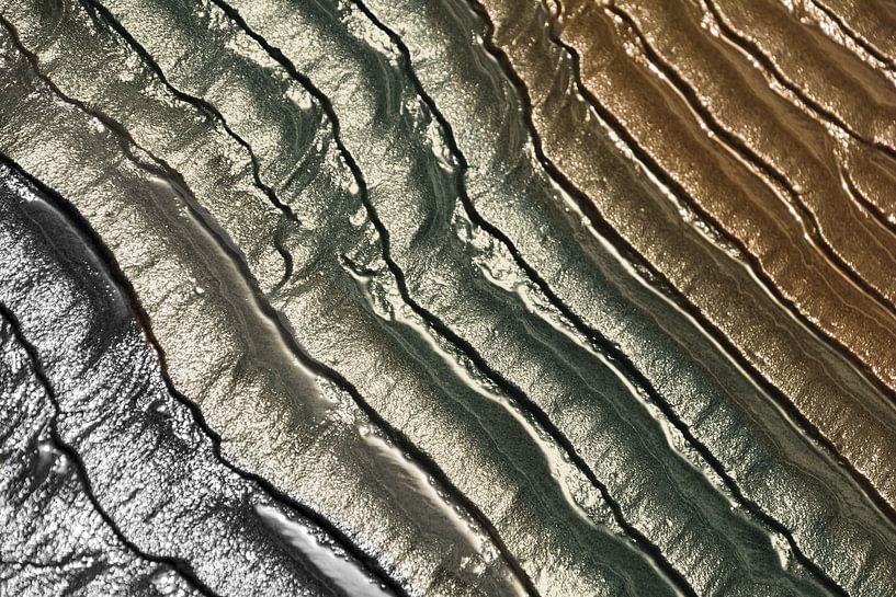 Sand pattern on the beach with unusual colour gradient by Lisette Rijkers
