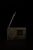 Old radio portrayed against a black background