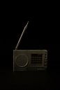 Old radio portrayed against a black background by Bram Jansen thumbnail