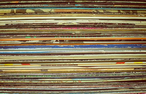 Stack of coloured LP sleeves