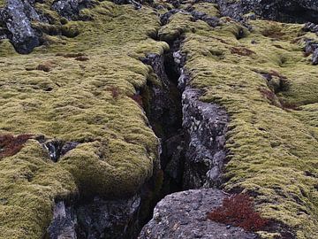 Deep crevice in the lava field of Svartsengi by Timon Schneider