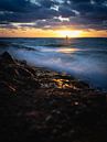 As the sun sinks into the sea on the Brouwersdam by Caatje Clicks thumbnail