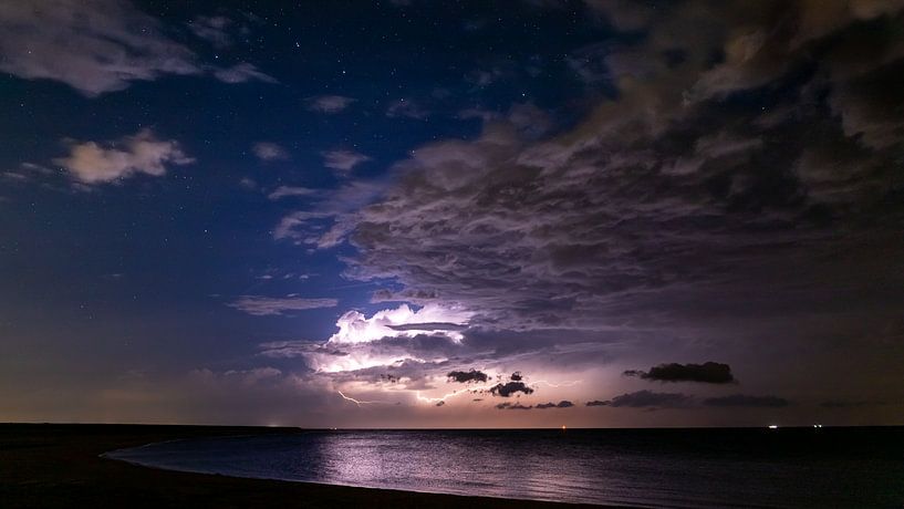 Thunderstorm over the IJsselmeer by Donny Kardienaal