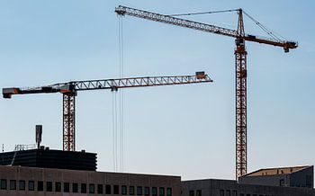 Tower cranes above new-build developments in the Netherlands