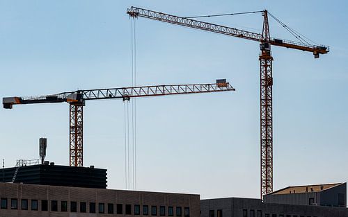 Torenkranen boven nieuwbouw in Nederland