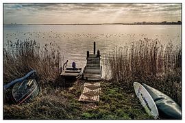 old boats on the waterfront by nol ploegmakers