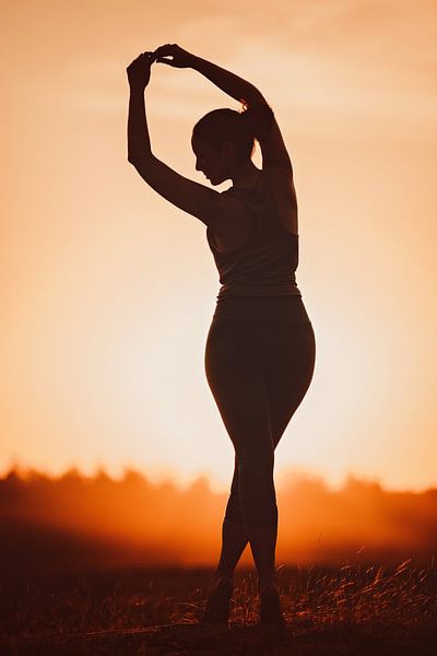 Yoga au coucher du soleil par Mijke Bressers