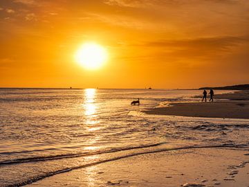 Sunrise on a beach in southern England. by Robert Szczotka