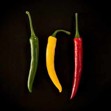 Trio of peppers - green, yellow and red by Mariska Vereijken