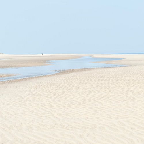 Lonely hiker on Oostkapelle beach