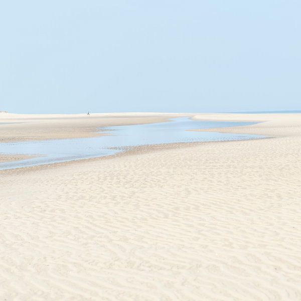Lonely hiker on Oostkapelle beach by Anouschka Hendriks