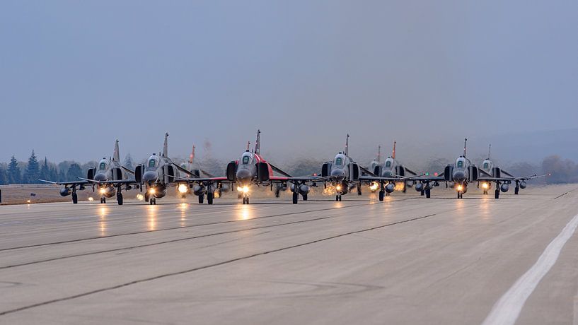 Elephant Walk with 9 F-4E Phantom II aircraft. by Jaap van den Berg