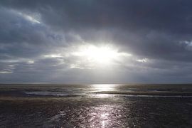 A ray of light over the Wadden Sea by Theodor Decker