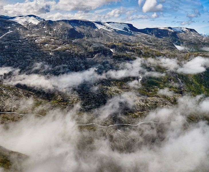 Look down at the cloud-covered road leading to Dalsnibba, Geiranger, Norway by qtx