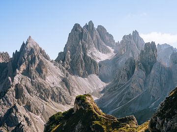 A hiker amongst the peaks of the Dolomites by Roy Mosterd