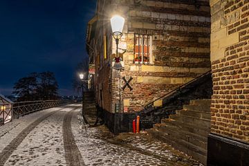 Elsloo le soir en hiver avec de la neige