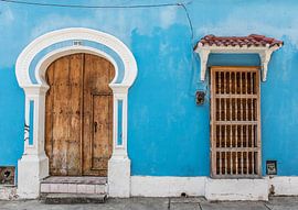 Blue facade of an old colonial house in Cartagena, Colombia by WorldWidePhotoWeb