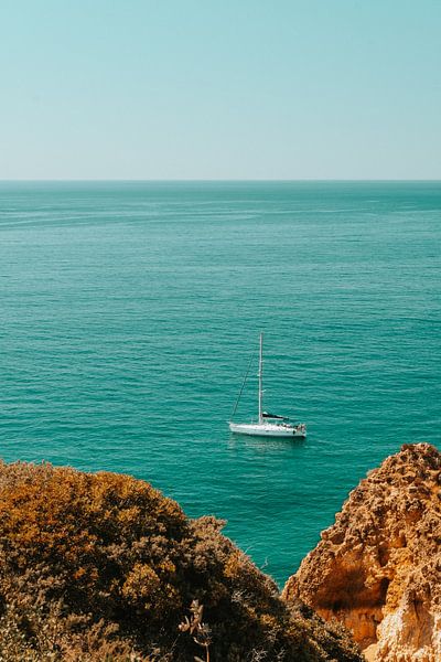 Sailing yacht off the Algarve coast by Swittshots
