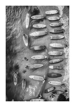 Aerial view Scattered surfboards on the sandy shore by Felix Brönnimann