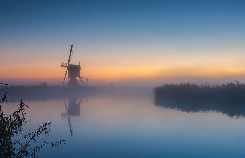 Misty sunrise at the windmill by Ilya Korzelius