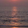 Zonsondergang in zee van Lotte Veldt