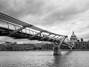 View of the Millennium Bridge over the River Thames with the dome of St. Paul's Cathedral in the bac by Carlos Charlez