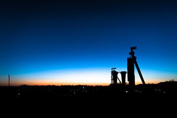 Förderturm bei Sonnenaufgang