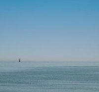 Sail giant on calm North Sea.
