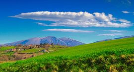 Blue green mountain landscape by Images from a hillside in Umbria
