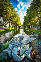 Sculpture with city moat at the Königsallee in Düsseldorf