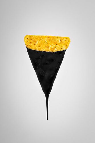 Black liquid over nacho