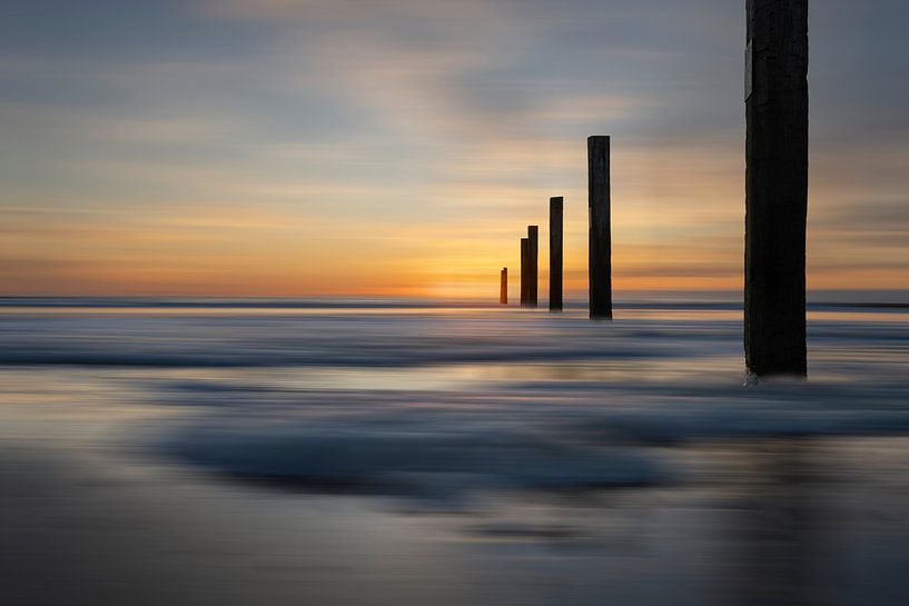 Beautiful sunset and sea foam North Sea beach by Peter Bartelings