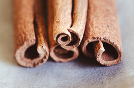 Cinnamon sticks, spices, Christmas decorations by Julia Strube - graphics