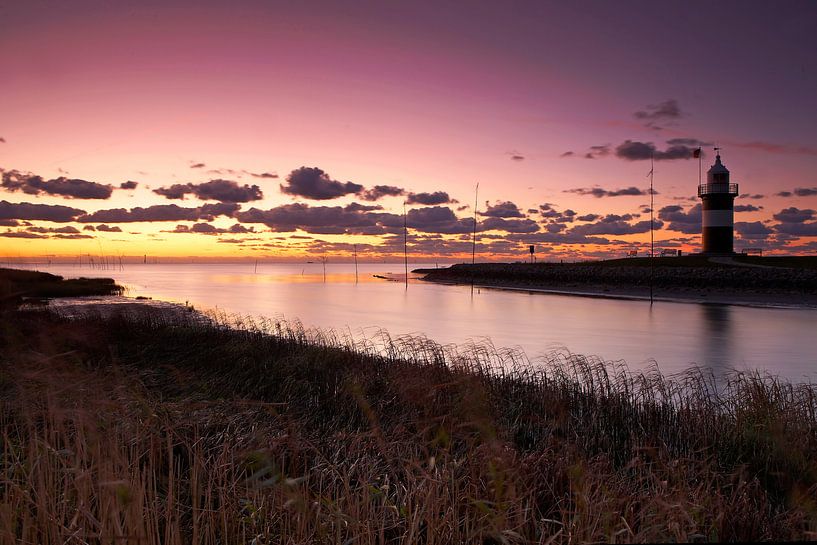 Wremen Lighthouse bij zonsondergang van Frank Herrmann