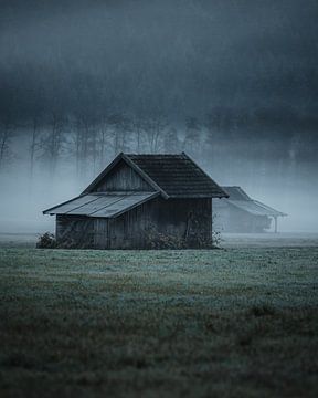 Stable in a gloomy autumn landscape by Daniel Kogler