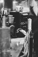 Antique telephone and scale in black and white