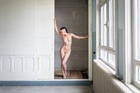 Artistic nude in an old building