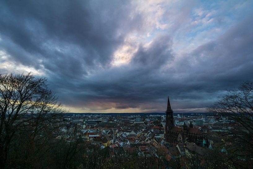 Skyline of the City of Freiburg im Breisgau from above at sunset by adventure-photos