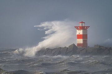 Storm on the coast at the lighthouse in Scheveningen