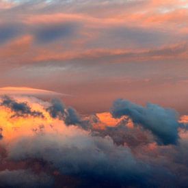 sunlit clouds by Jacqueline van Leeuwen