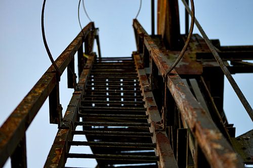 Stairs on an old rusted bridge
