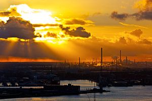 Cloud rays above Rotterdam harbor