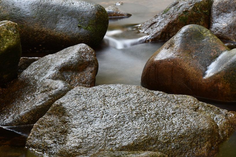 Rocks in water by Cor Brugman