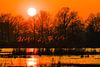 Zonsondergang in oranje tinten van René van der Horst thumbnail