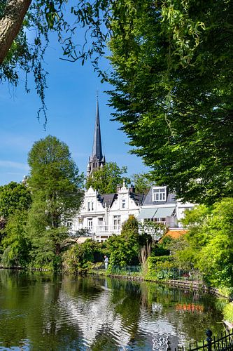 View of old church Kralingen by the pond