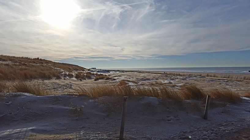 At the beach.  par Il se