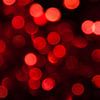 Red bokeh by Evelyne Renske