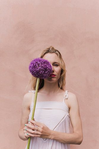 Flowergirl with purple flower